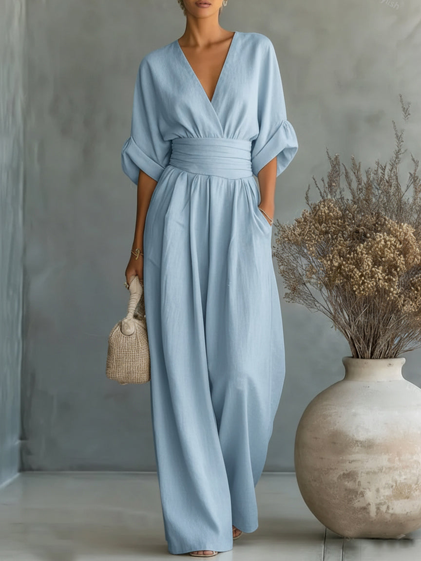 ELEGANTE MONO CON ESCOTE EN V Y CINTURA ALTA