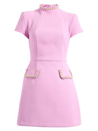 MINIVESTIDO ROSA CON RIBETE DE PERLAS