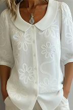 ELEGANTE BLUSA FLORAL
