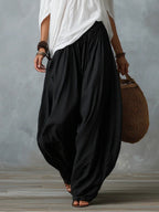 Conjunto de Top Blanco con Hombros Descubiertos y Pantalón Acampanado Estilo Lantern