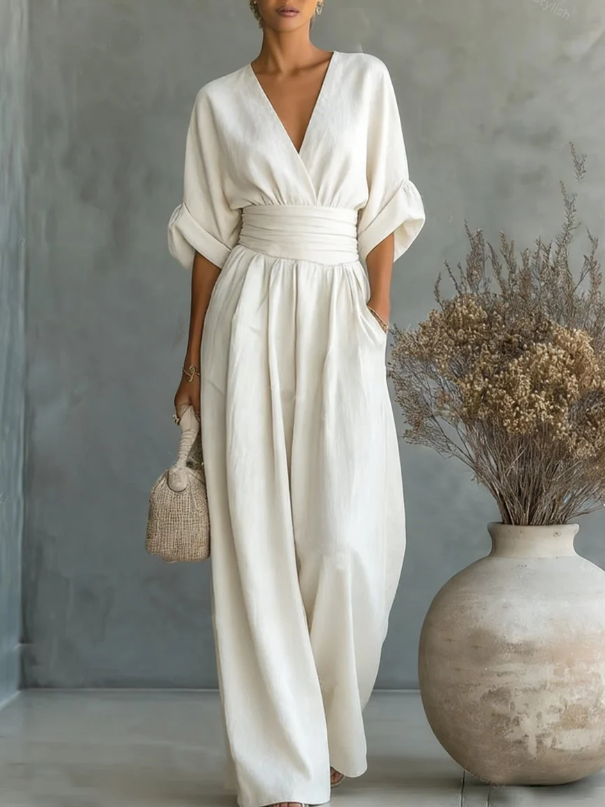ELEGANTE MONO CON ESCOTE EN V Y CINTURA ALTA