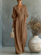 ELEGANTE MONO CON ESCOTE EN V Y CINTURA ALTA