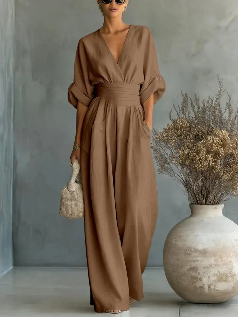 ELEGANTE MONO CON ESCOTE EN V Y CINTURA ALTA
