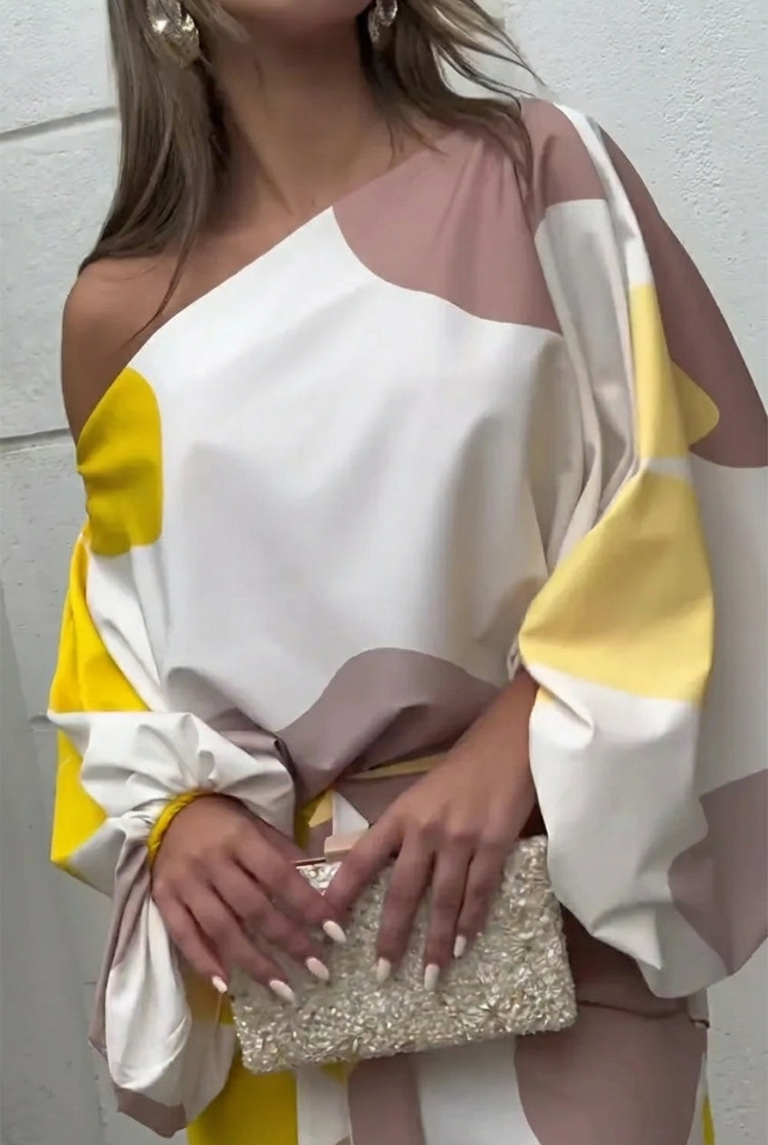 CONJUNTO DE DOS PIEZAS CON FLECOS Y ESTILO ELEGANTE