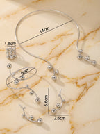 Conjunto de pendiente, collar, anillo y pulsera