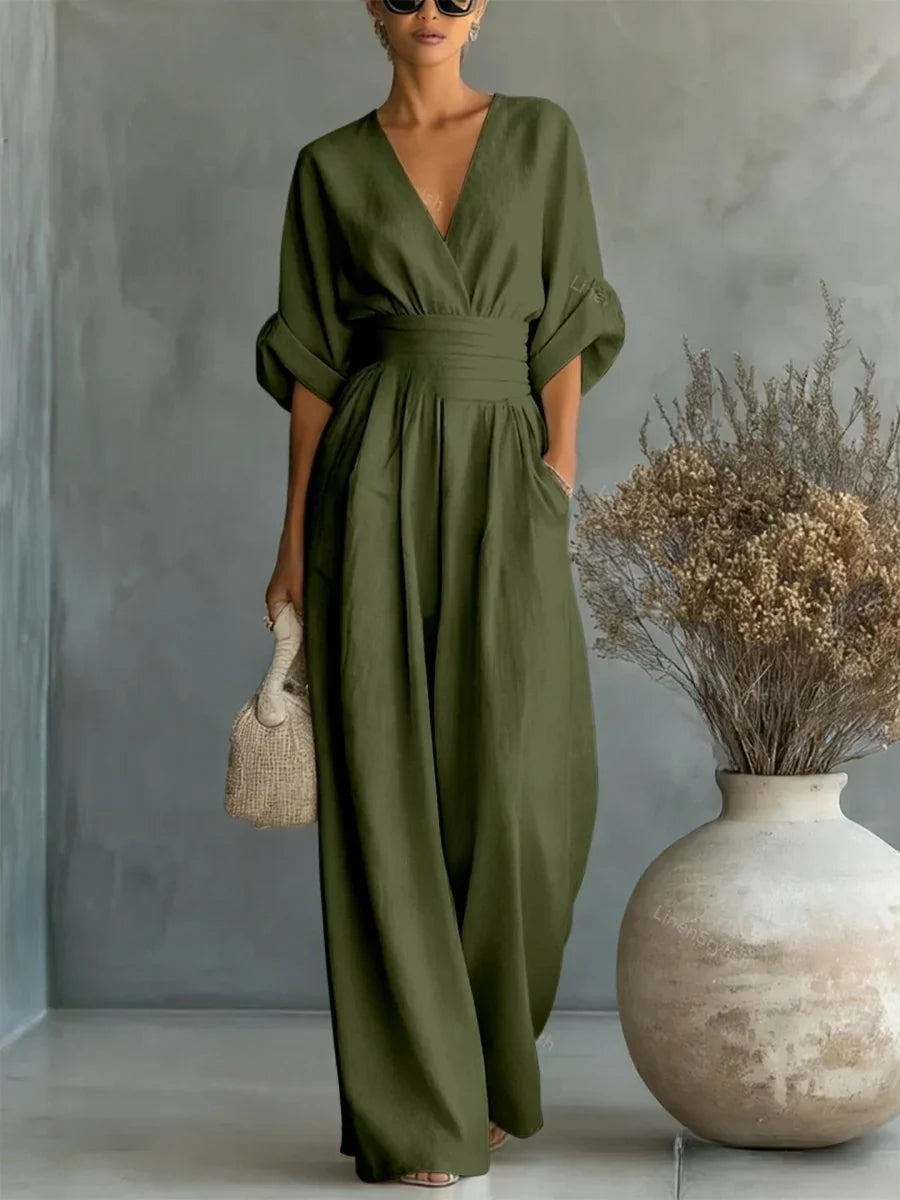 ELEGANTE MONO CON ESCOTE EN V Y CINTURA ALTA