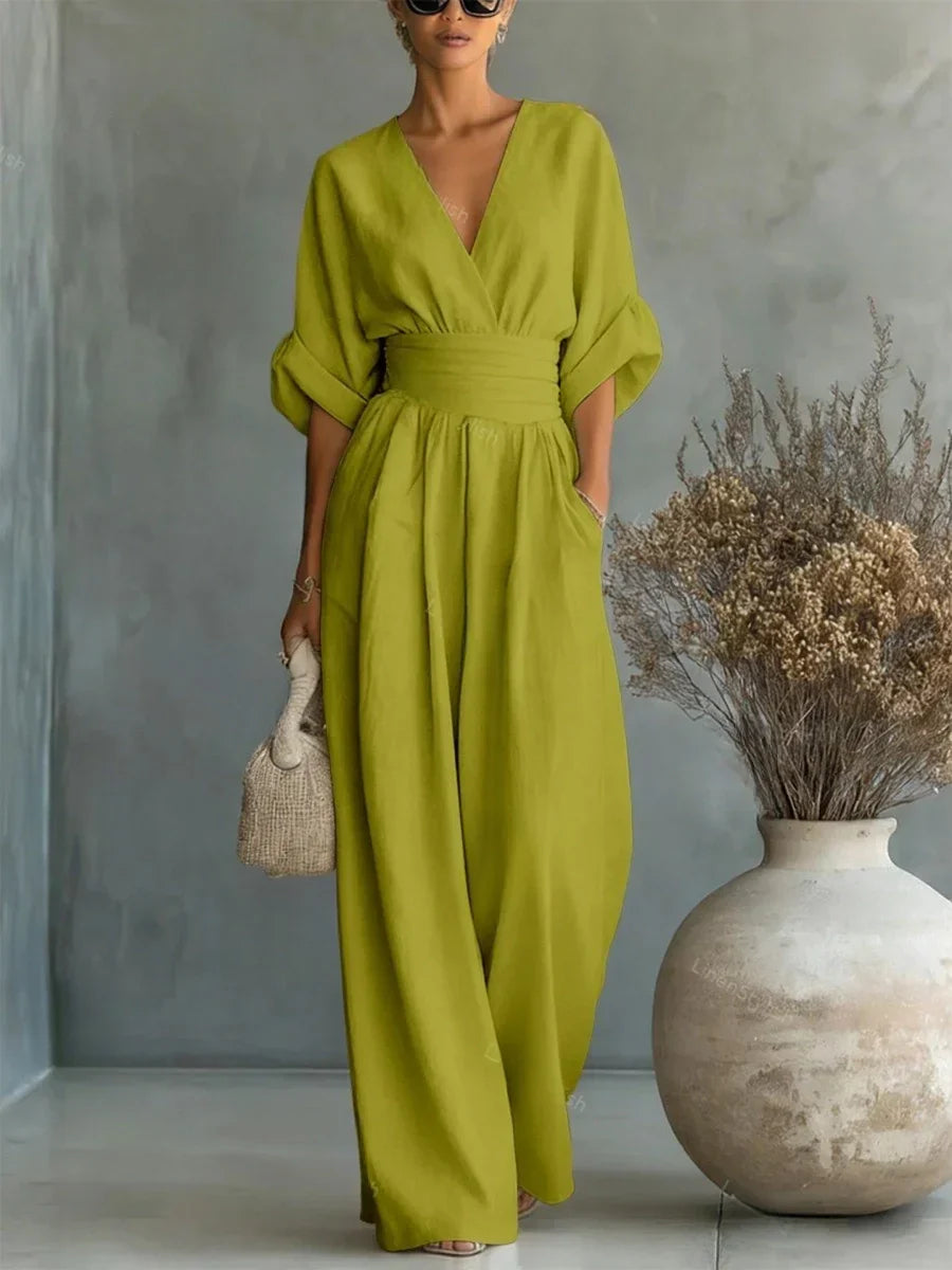 ELEGANTE MONO CON ESCOTE EN V Y CINTURA ALTA